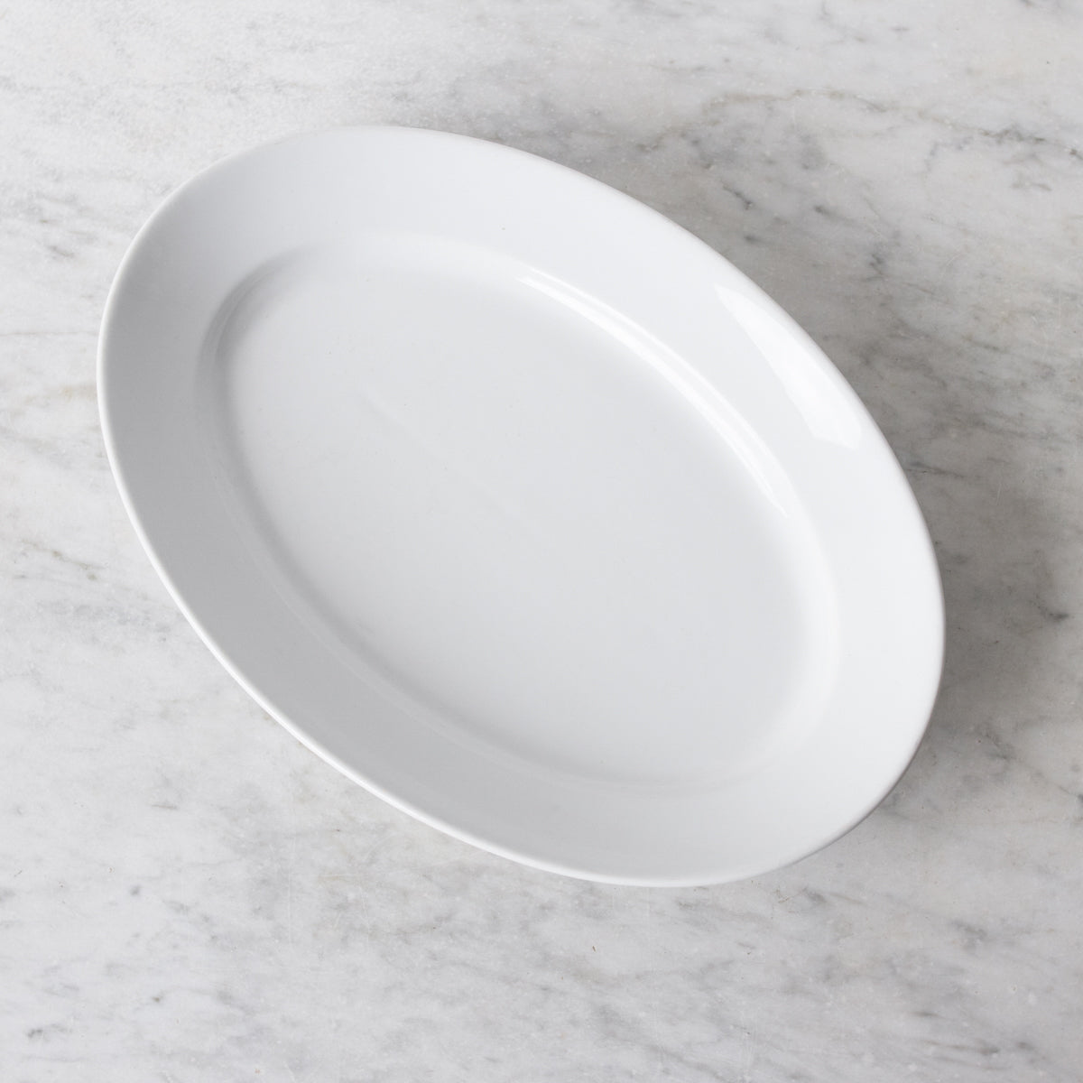 Plat ovale Pillyvuyt avec cuillère en argent