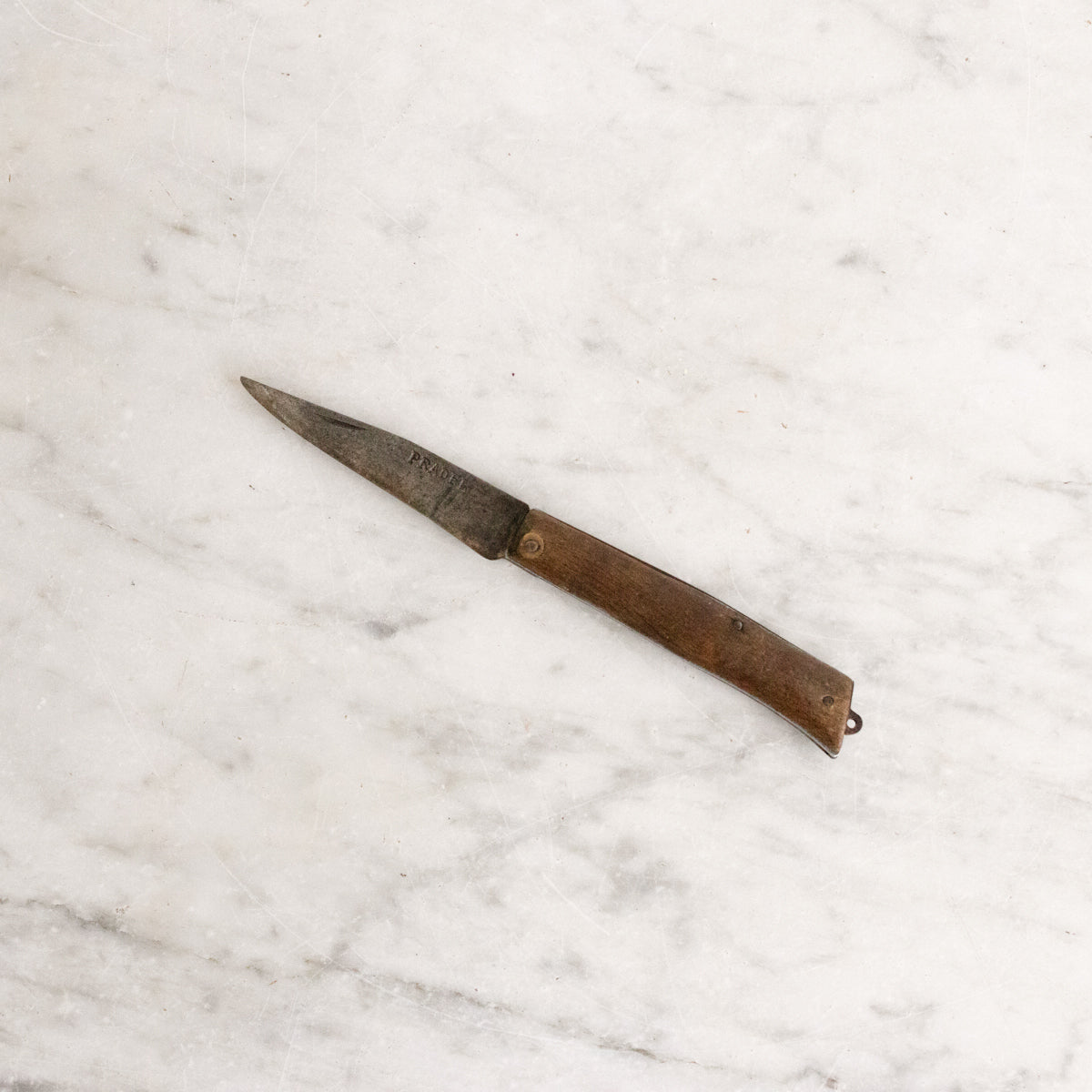 Coupe-capsule antique