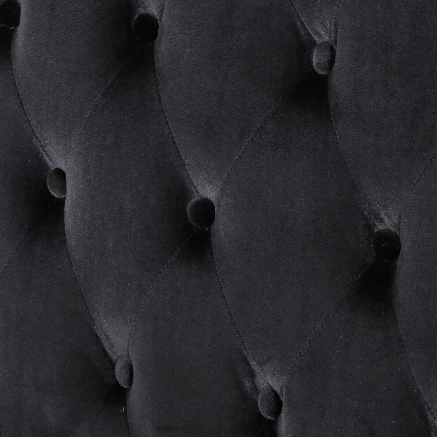 Canapé à oreilles hautes capitonné en velours noir