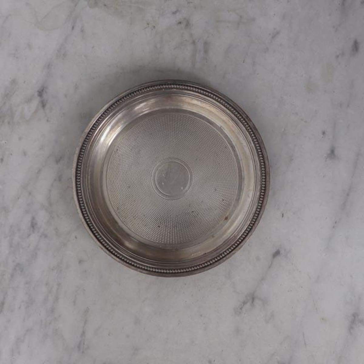 Dessous de verre argenté de l'hôtel