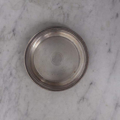 Dessous de verre argenté de l'hôtel