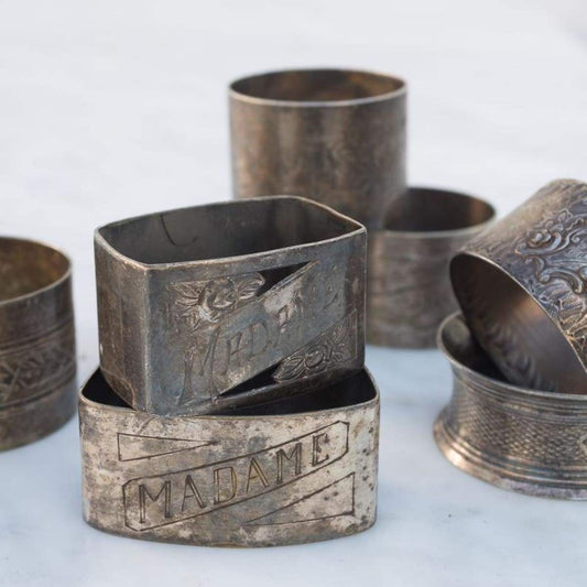Lot de 4 ronds de serviette vintage en argent